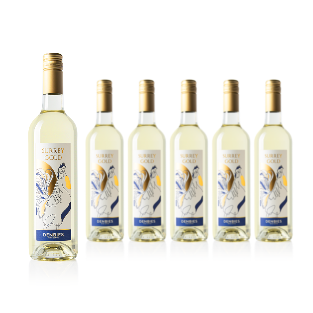 Front view of six Surrey Gold wine bottles by Denbies Wine Estate isolated on a transparent background
