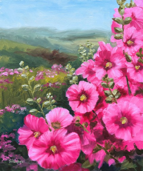 An oil painting of vibrant pink hollyhocks in a field with a soft-focus background of green hills and a blue sky.