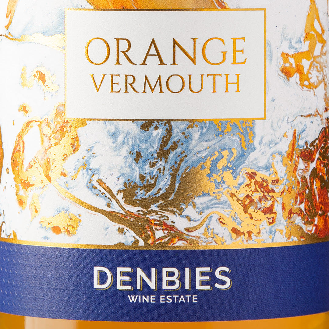 Close-up detail of the Orange Vermouth label showing the art and typography